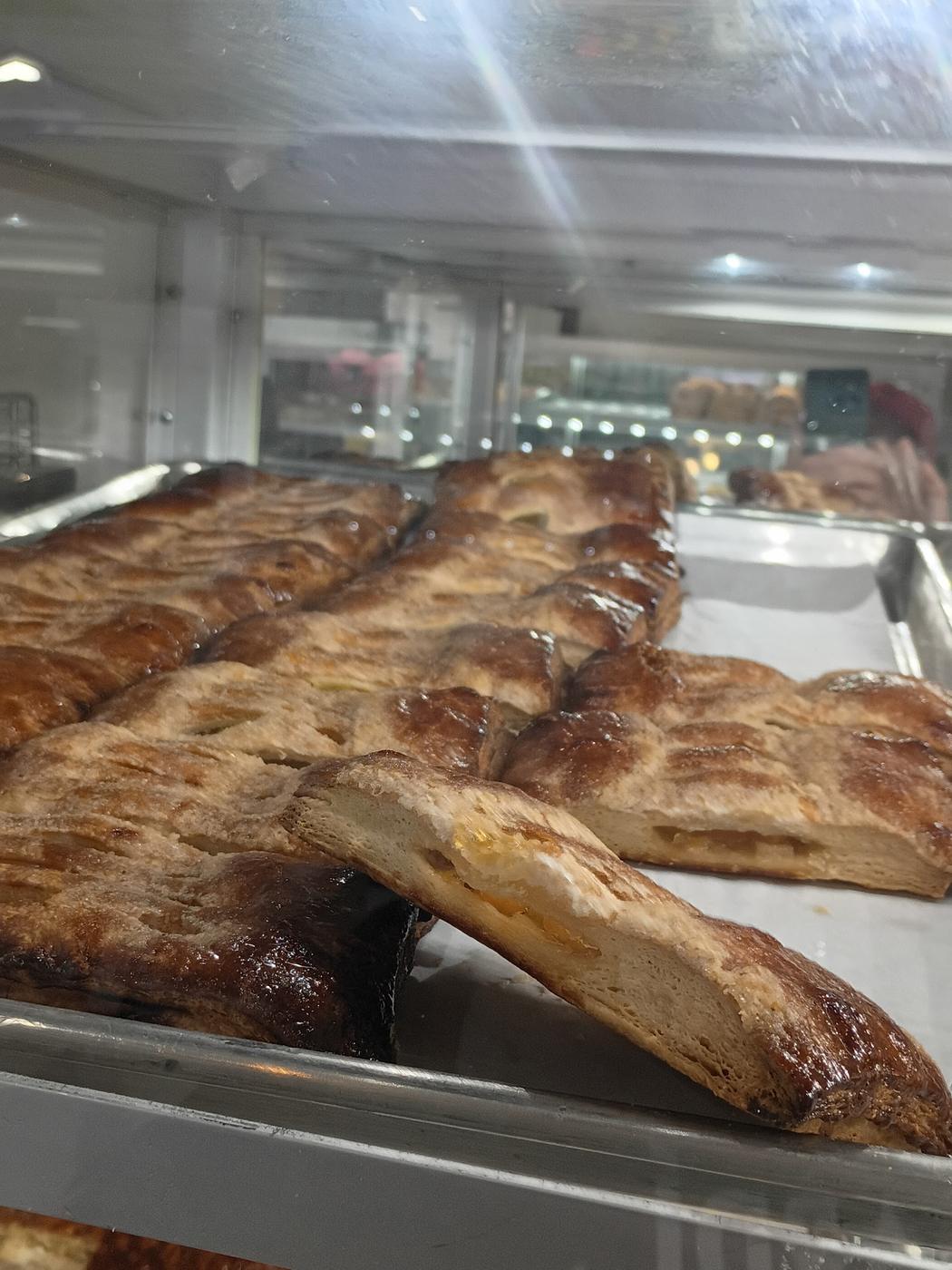 Fresh baked empanadas in the display case at Diana's Bakery.